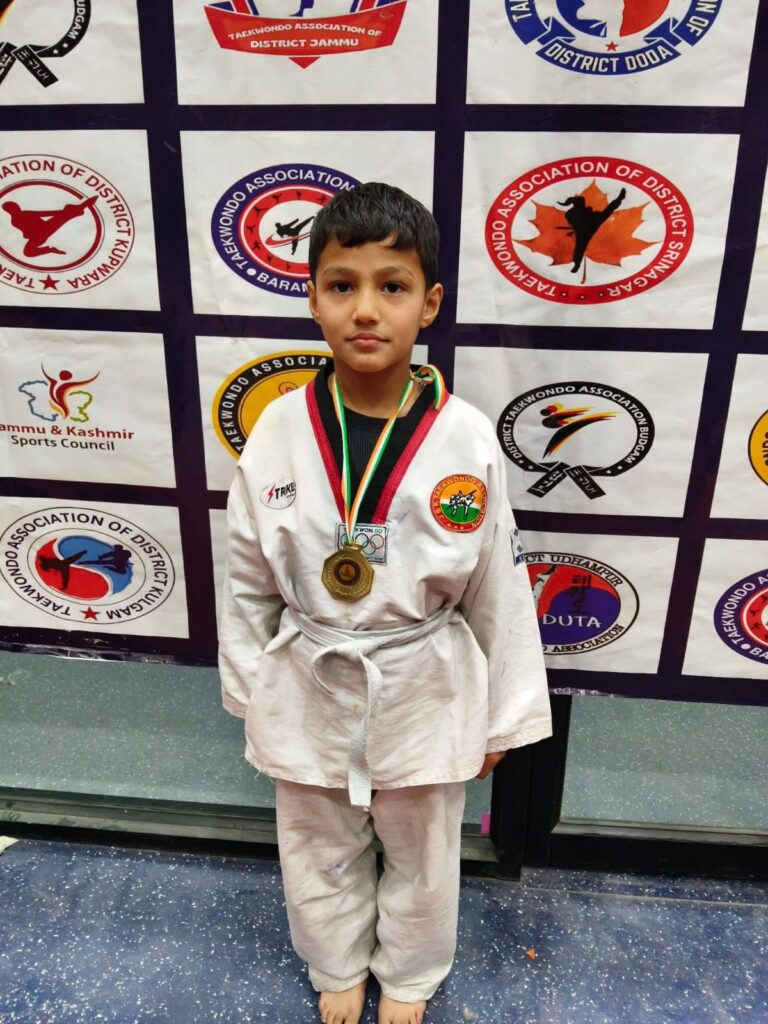 TAEKWONDO-768x1024 Abhay Partap Singh, a Class III student of Spring Dales English School, Changran, Kathua, has brought immense pride to his school and district by securing selection in the Jammu & Kashmir Union Territory Sub-Junior Taekwondo Team (Kyorugi – Boys) for the 2025–26 session.